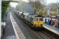 66514 passes through Castleton on an Immingham to Fiddlers Ferry coal train on 21 October 2015. R Clarke